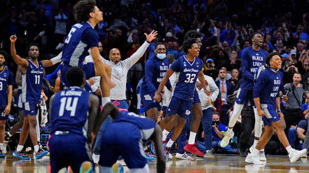 Saint Peter’s celebrates its win over Purdue